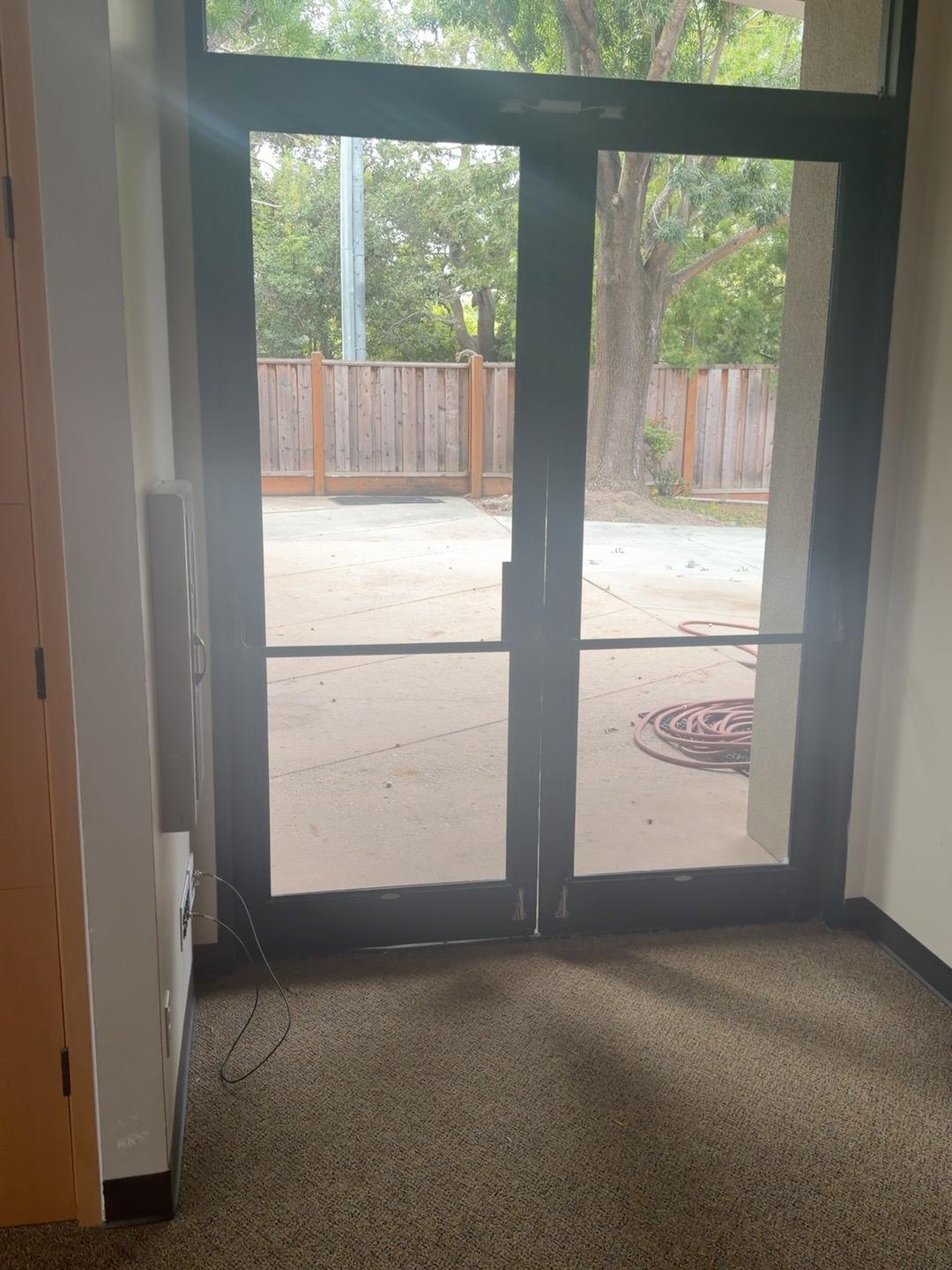 Facility interior glass door cleaning
